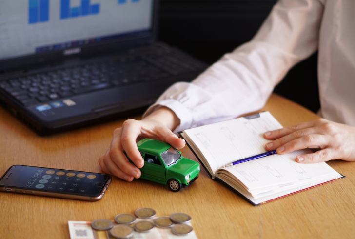 Person planning car loan payments