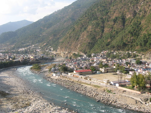 The river flows past Uttarkashi (Alt. 3,800 ft.) in the backdrop of The Himalayas.